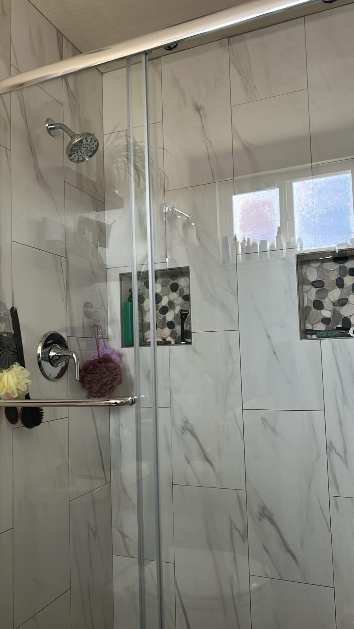 Crystal clear shower glass after detailed cleaning