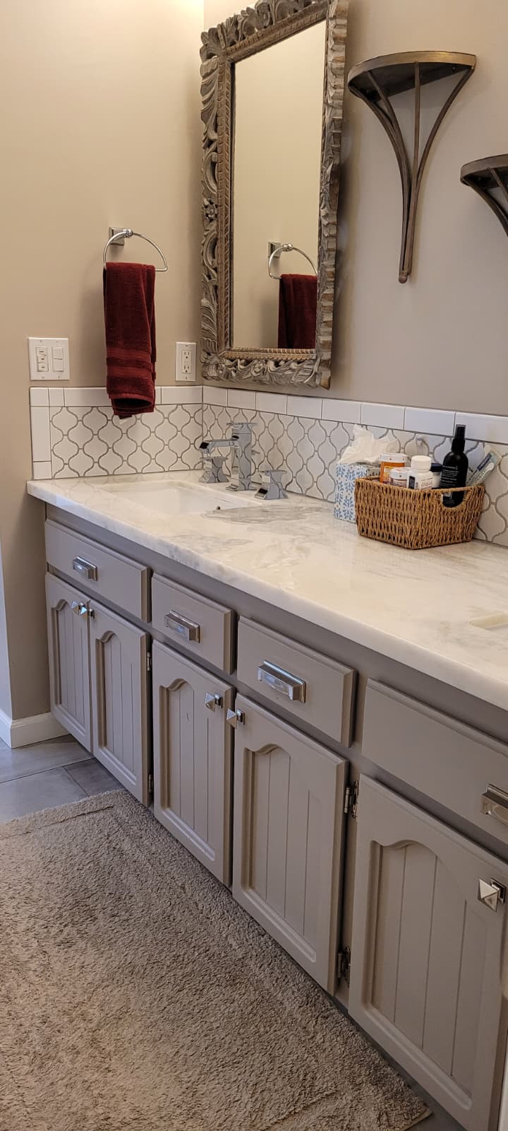 Finished double vanity with clean counter and mirrors